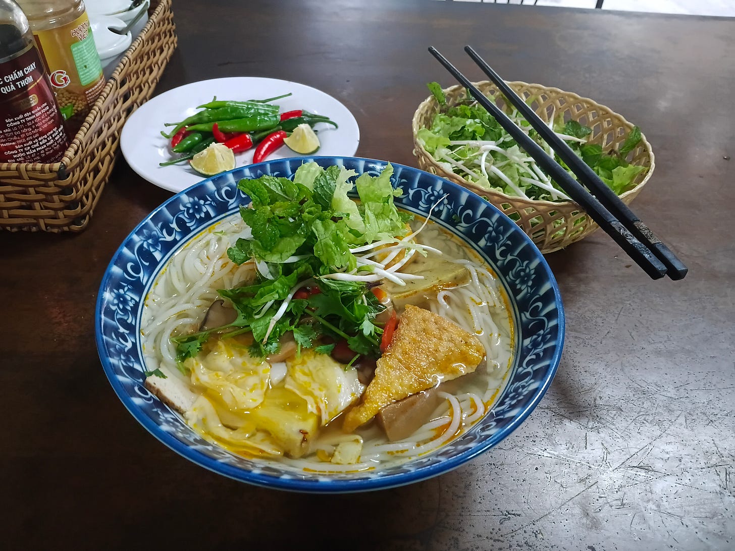 bowl of delicious noodle and herbs
