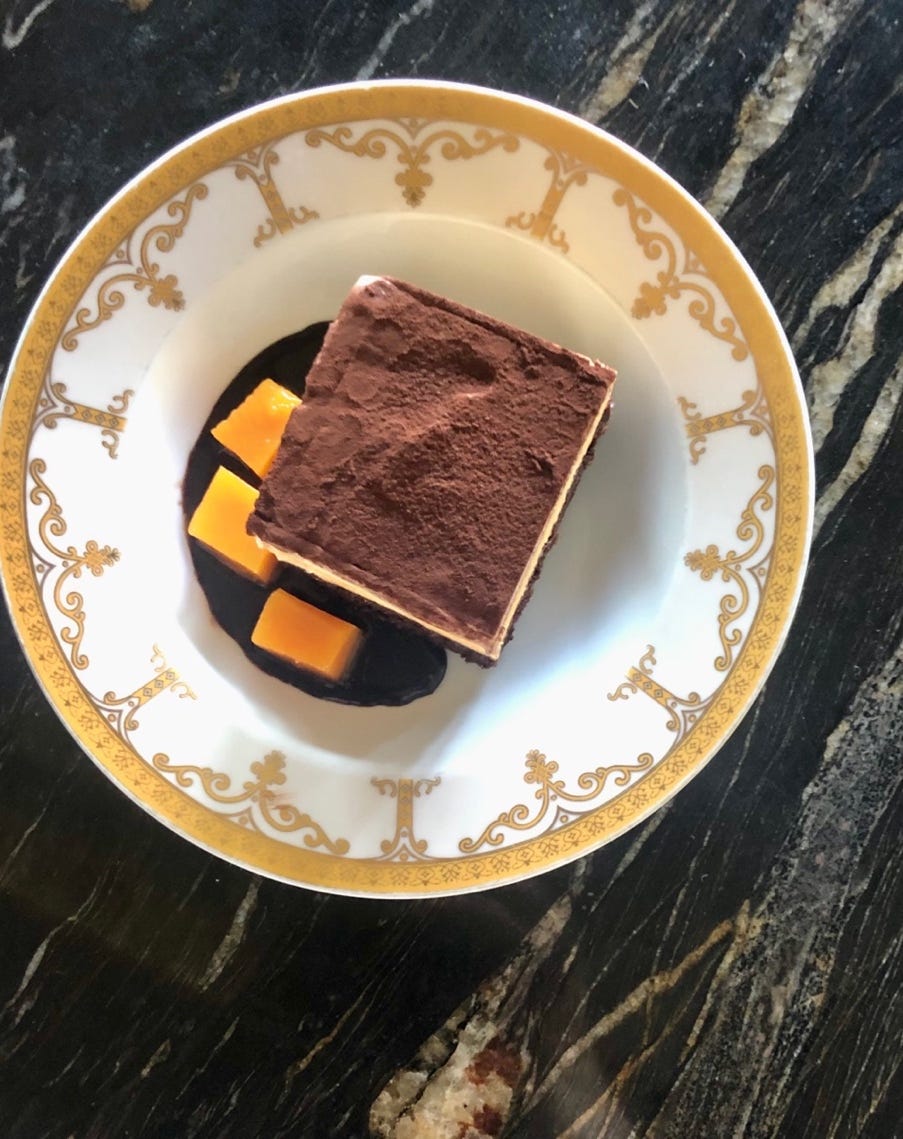 A plate of food on a table

Description automatically generated