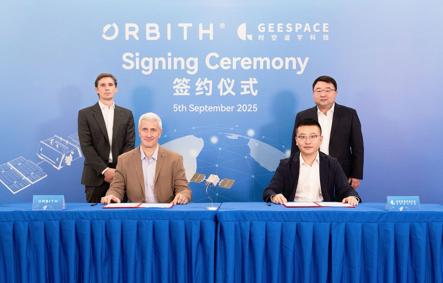 Delegations from Geespace (right) and Orbith (left) at the signing ceremony.