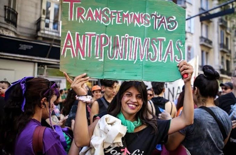 A person holding a sign
AI-generated content may be incorrect. A person holding a sign
AI-generated content may be incorrect.