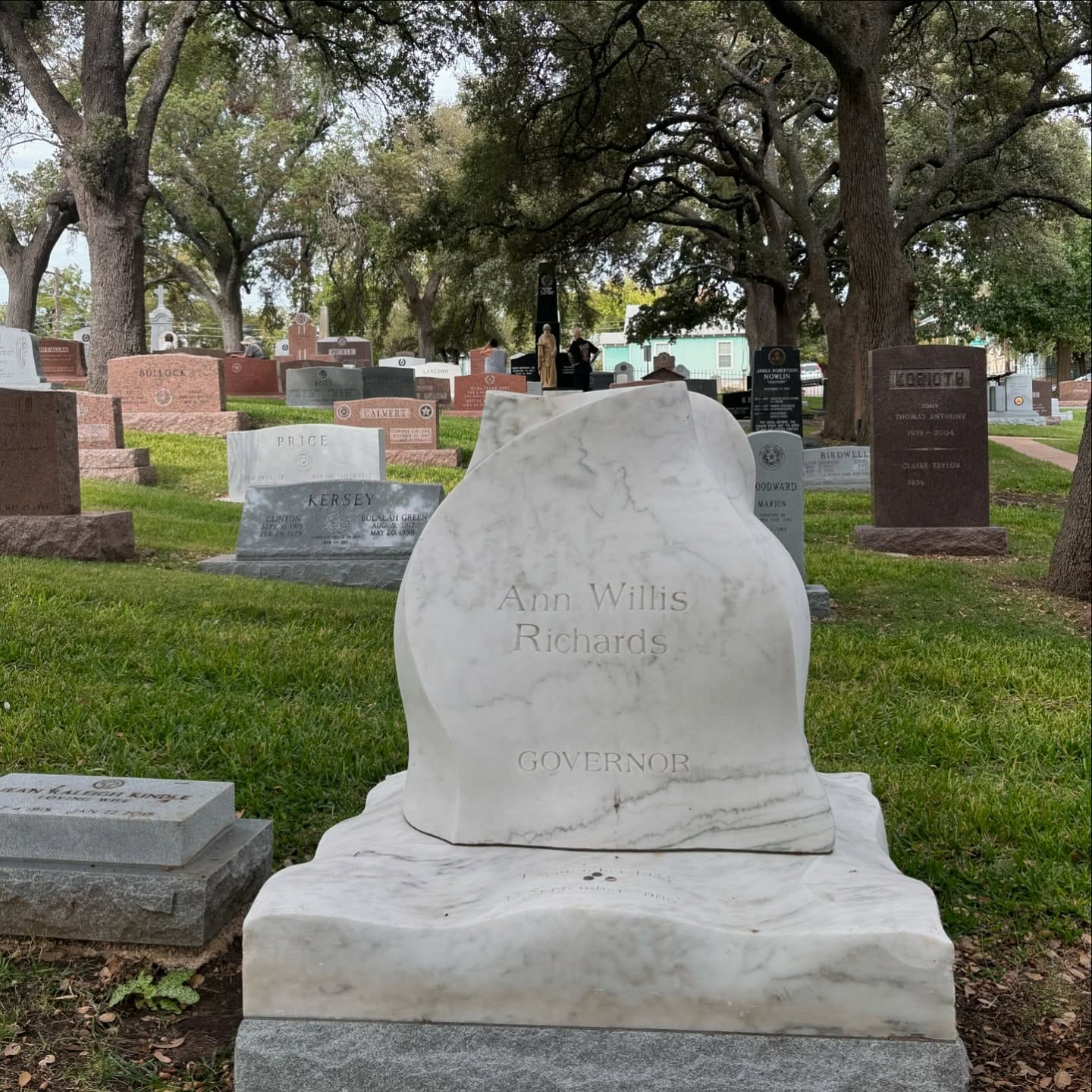 May be an image of 2 people and monument
