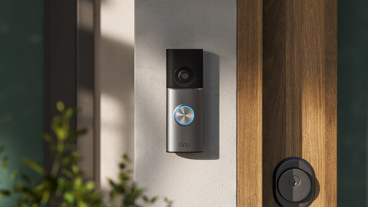 Ring video doorbell mounted next to wooden door frame
Ring video doorbell mounted next to wooden door frame