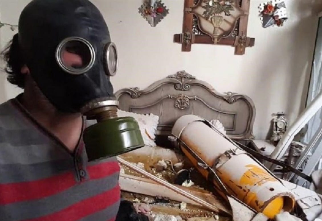 A person wearing a gas mask

AI-generated content may be incorrect.