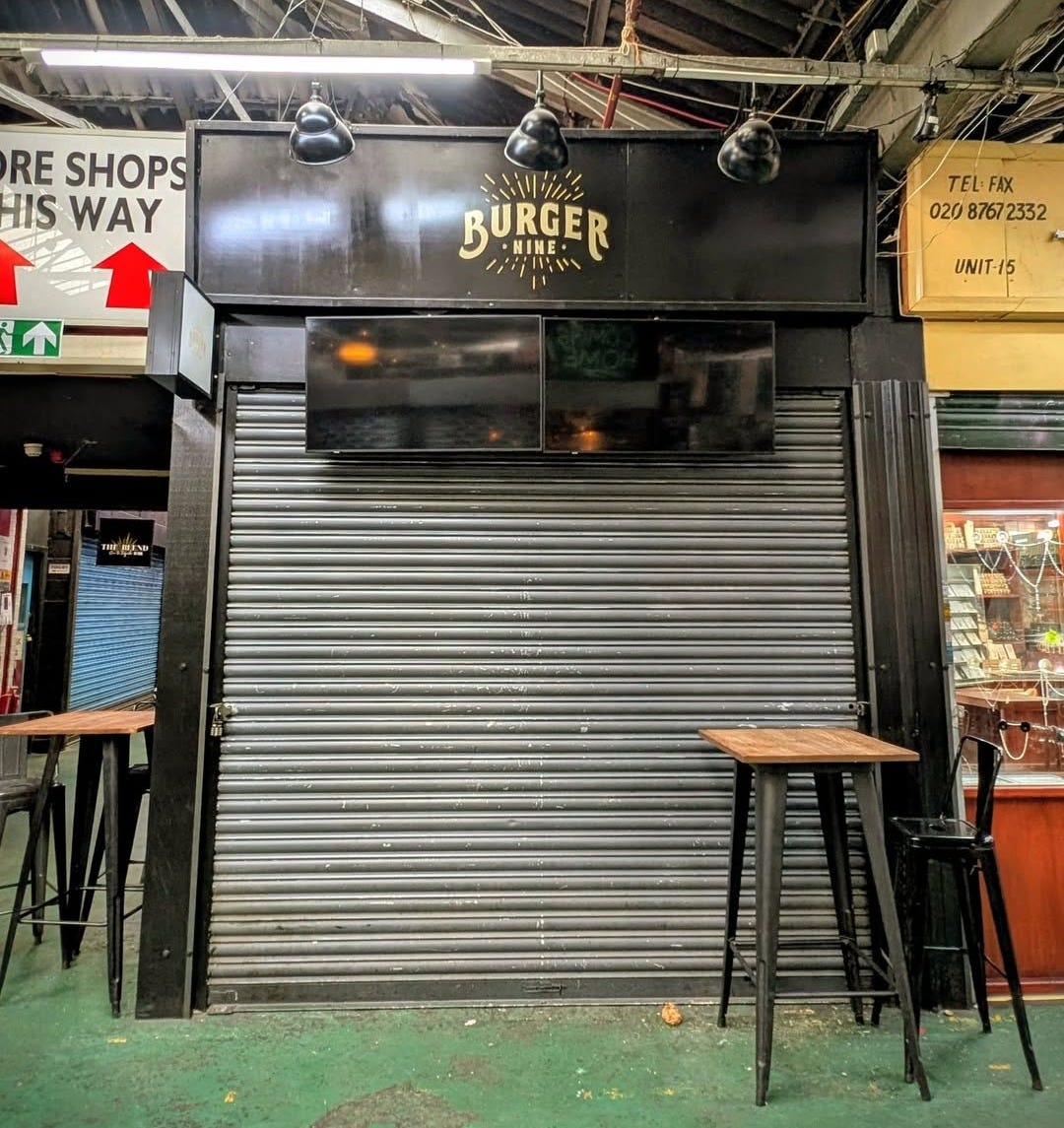 May be an image of burger and text that says "BAL RE SHOPS HIS WAY MiPin BURGER NINE NINES TELFAX FAX TEL 020 8767 02087672332 72332 UNIT-15 Tai 許民 Hí か"