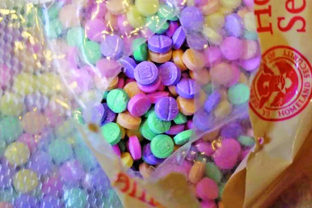 Some of the 5,000 brightly-colored fentanyl pills recently discovered by border patrol agents strapped to a suspect’s leg. The pills’ small size and high potency translate into big profits for traffickers — upwards of $1.2 million per kilogram. Some of the 5,000 brightly-colored fentanyl pills recently discovered by border patrol agents strapped to a suspect’s leg. The pills’ small size and high potency translate into big profits for traffickers — upwards of $1.2 million per kilogram.