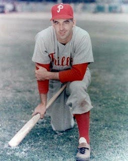 A baseball player squatting on the ground

AI-generated content may be incorrect.