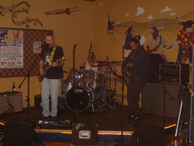 Take one talented musician with a liking for roots rock and add in bass and drums, you get the Aaron Howell Band. Aaron's the guy with the guitar. Take one talented musician with a liking for roots rock and add in bass and drums, you get the Aaron Howell Band. Aaron's the guy with the guitar.