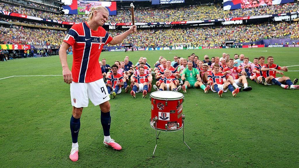 Erling Haaland leads the Norway team in the 'Viking row' celebration following their 2-1 victory over Brazil. Erling Haaland leads the Norway team in the 'Viking row' celebration following their 2-1 victory over Brazil.