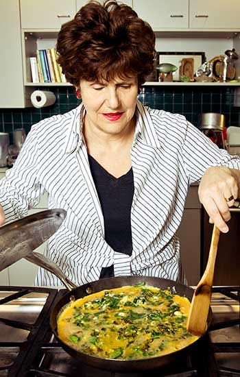 Joan Nathan cooking a frittata in her kitchen Joan Nathan cooking a frittata in her kitchen