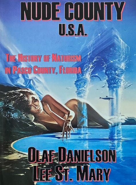 A collection of prizes featured in the 2025 AANR Education Foundation Art Raffle, including books, original artwork, and photography—each donated by members of the naturist community.