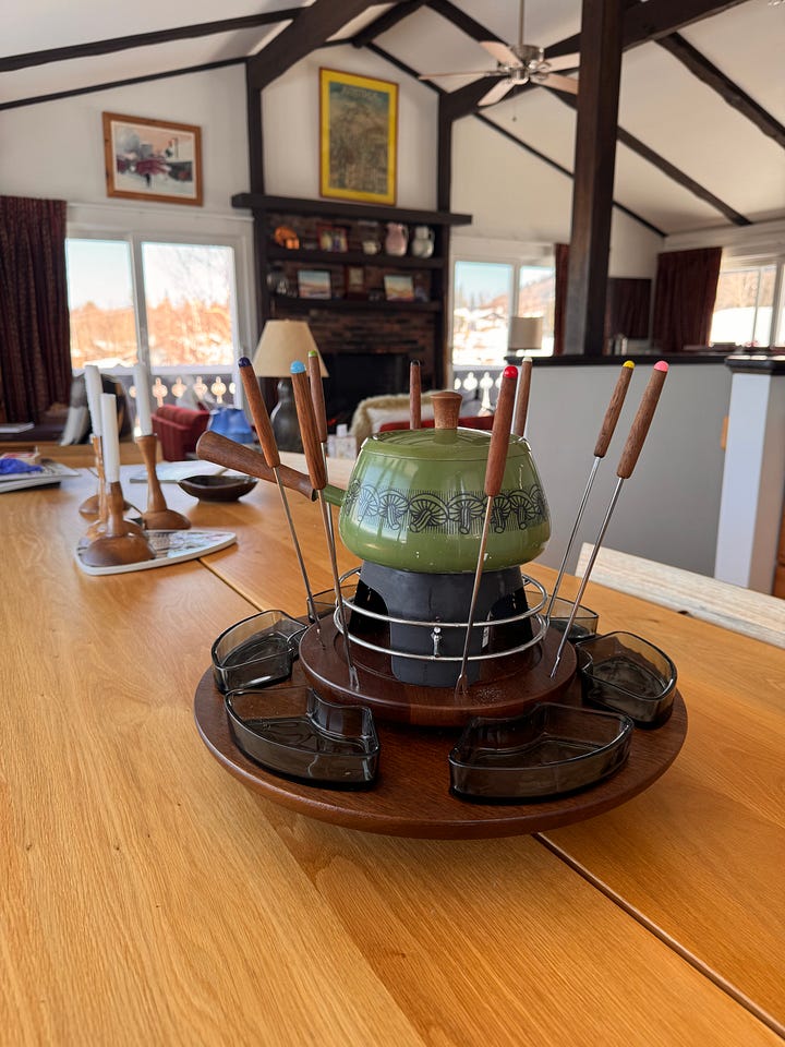 What a I doing in a dirndl? Fancy fondue set!