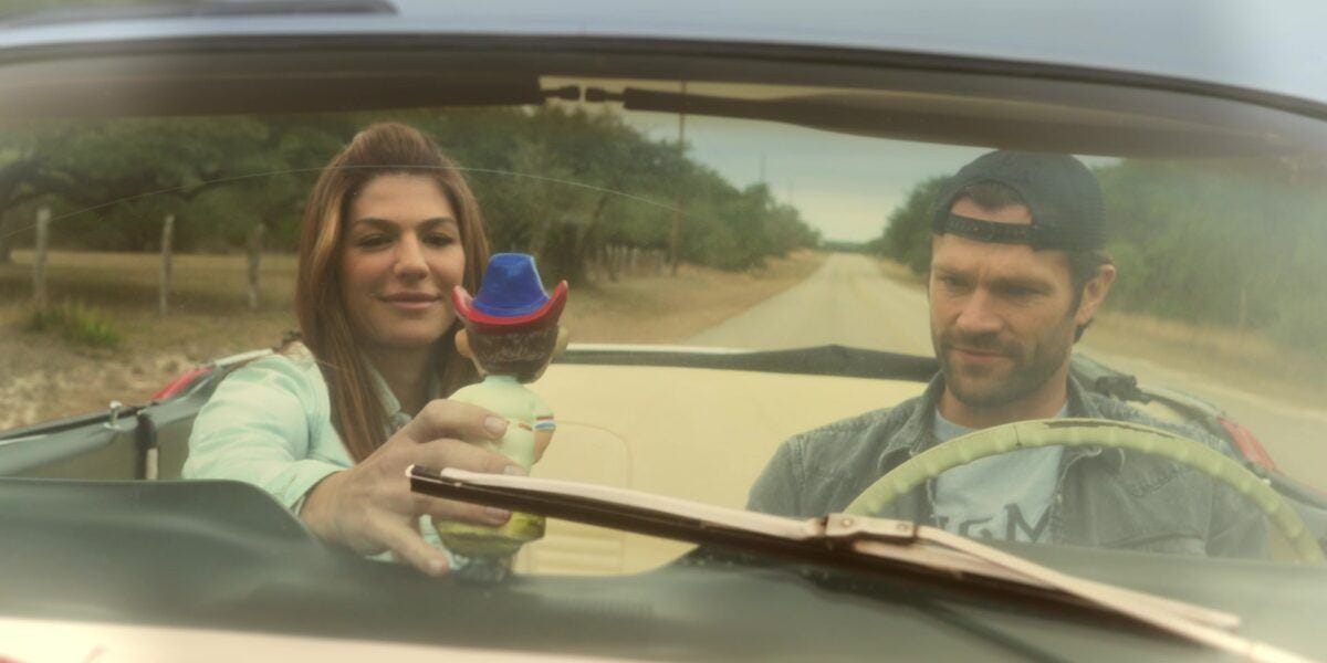 Walker flashback Emily puts bobblehead on Jared Padaleckis dashboard Walker flashback Emily puts bobblehead on Jared Padaleckis dashboard