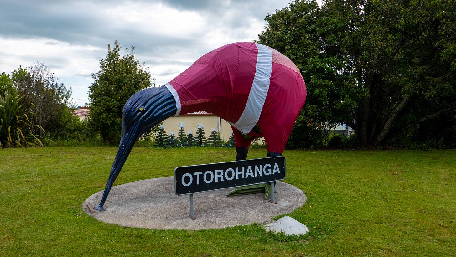 A giant kiwi wearing a santa suit, with the town name in front: Otorohanga