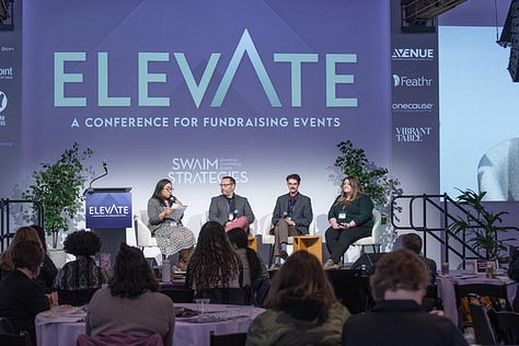 Brandon Lenzi on the stage at the Elevate Conference.