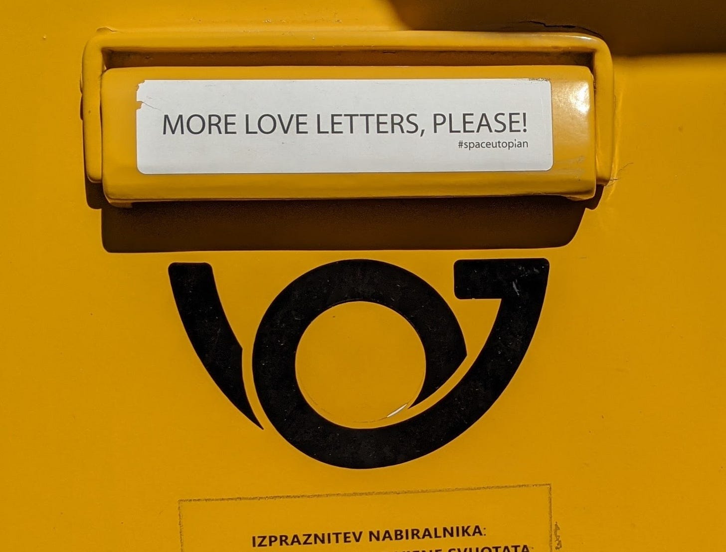 Slovenian post box with a sticker saying more love letters please Slovenian post box with a sticker saying more love letters please