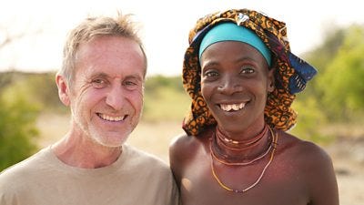 Bruce with with Muetuelachy, a young Mucubal woman in the village of Cavelocamue in the Namib Desert, southern Angola.
