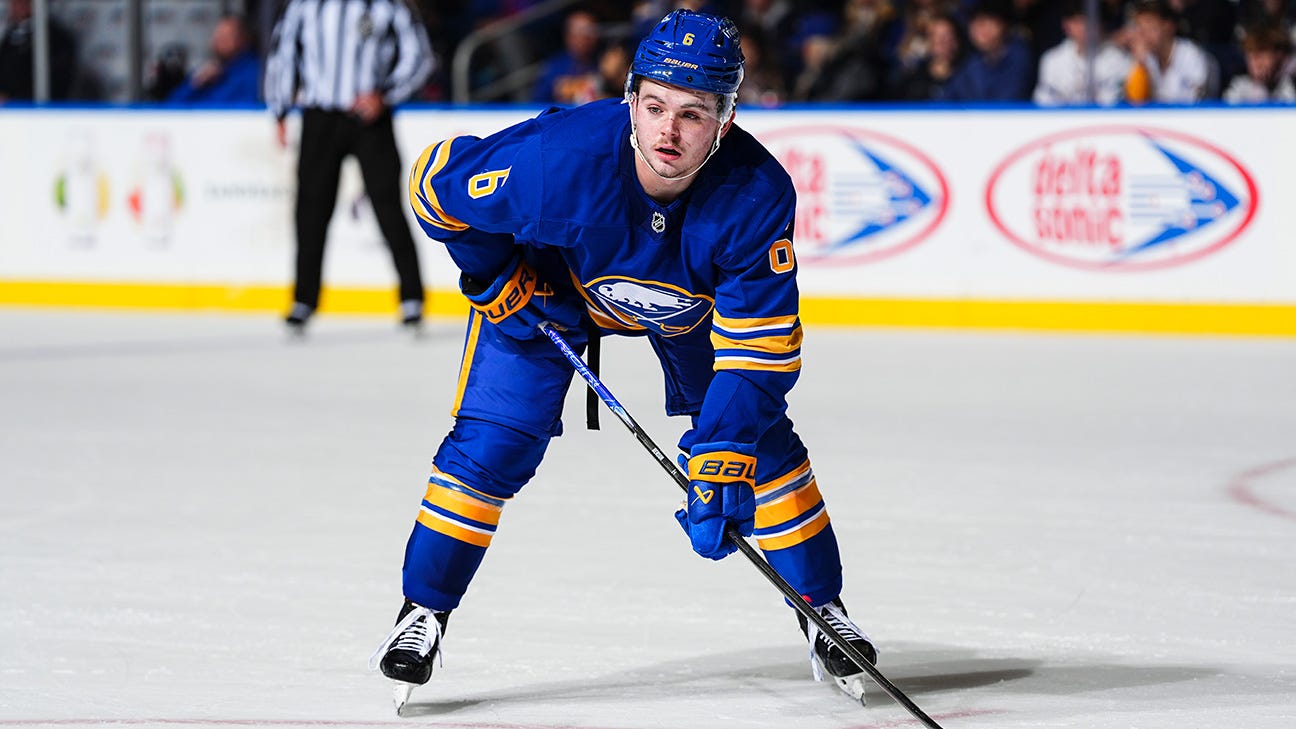Sabres forward Zach Benson watches the faceoff
