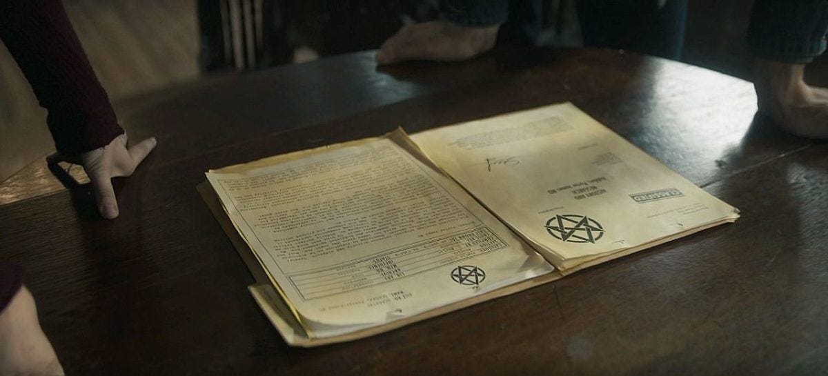 John Mary Winchesters looking at Men of Letters papers 1.10. John Mary Winchesters looking at Men of Letters papers 1.10.