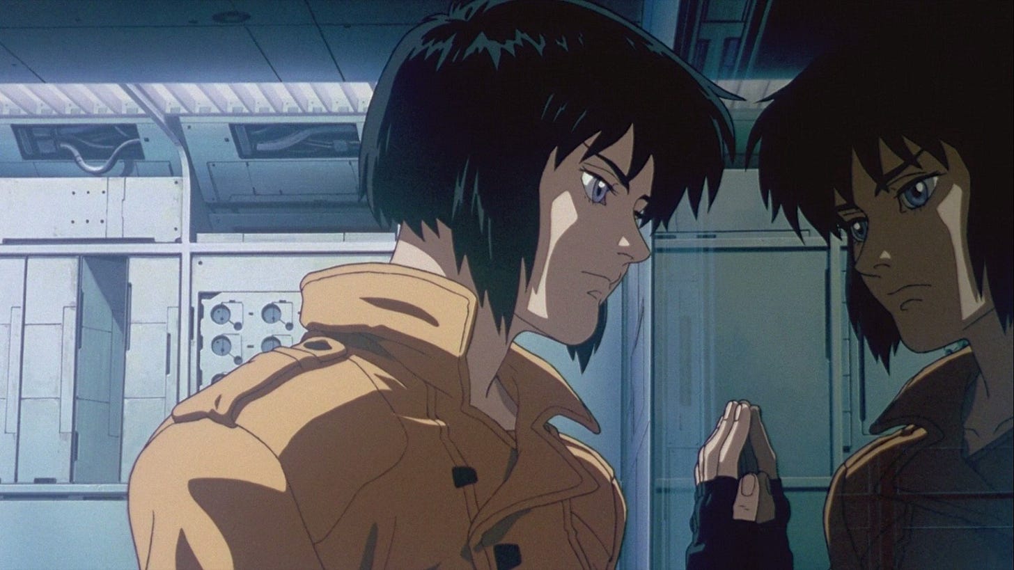 Ghost in the Shell | Still features protagonist Motoko Kusanagi looking out a window.