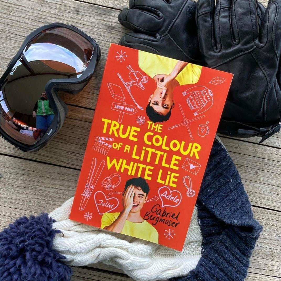 May be an image of 1 person and book