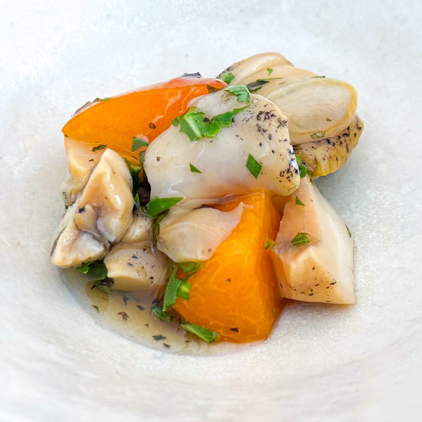 Whelks with apricot, ponzu and arugula at Bittikesu, Paris 4th Whelks with apricot, ponzu and arugula at Bittikesu, Paris 4th