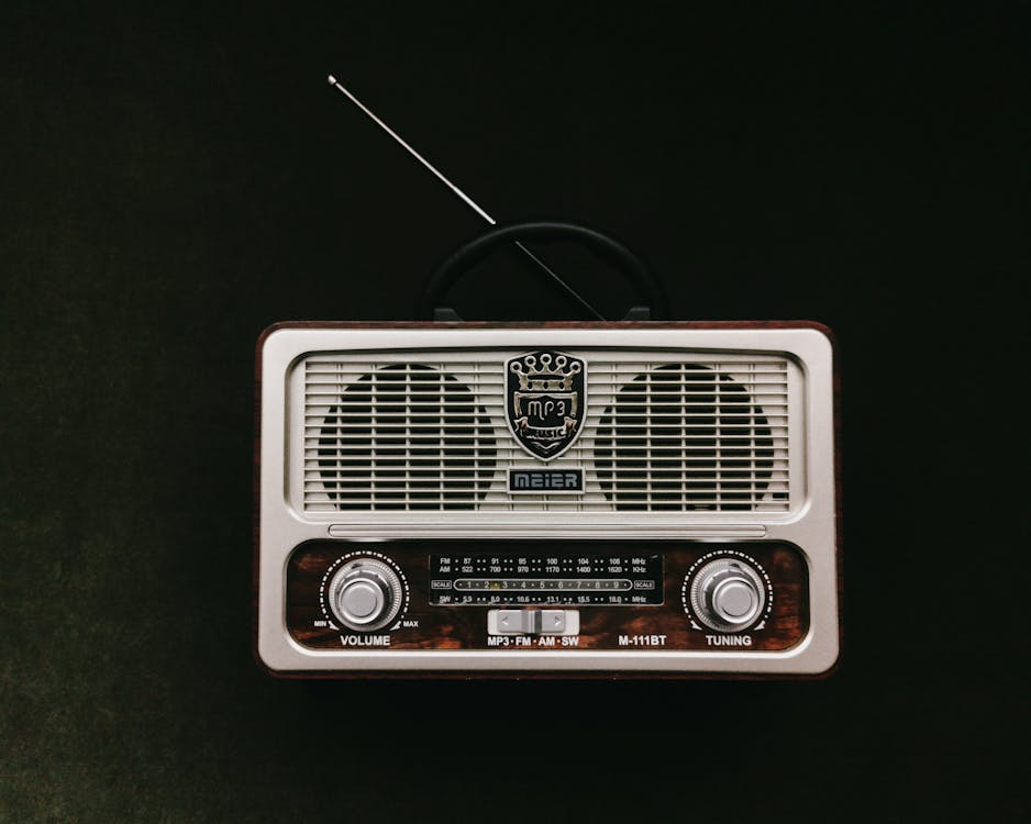 Free Close-up of a vintage Meier radio on a black background, showcasing its retro design. Stock Photo
