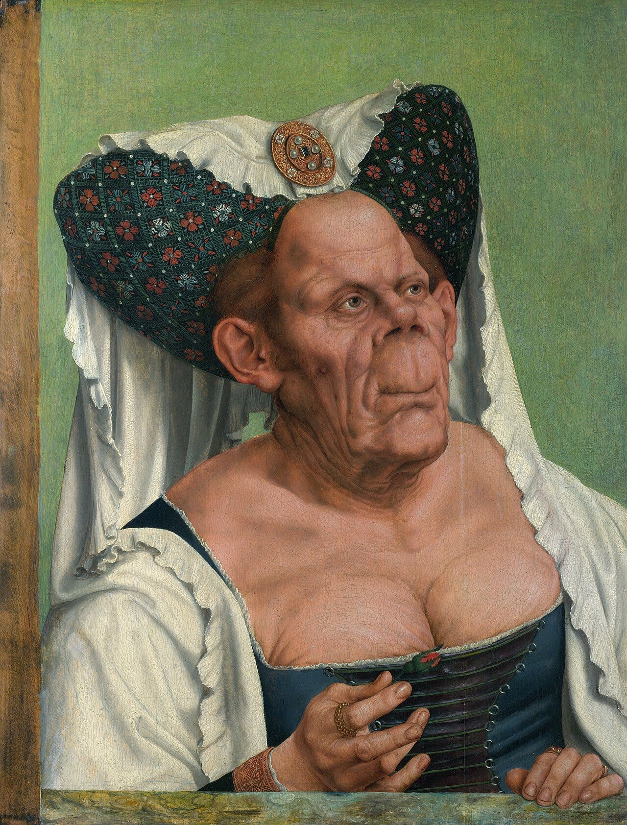 Quinten Massys's An Old Woman, a half-length portrait of an elderly woman with a wrinkled chest, a horned headdress and a rosebud in her hand, against a green background