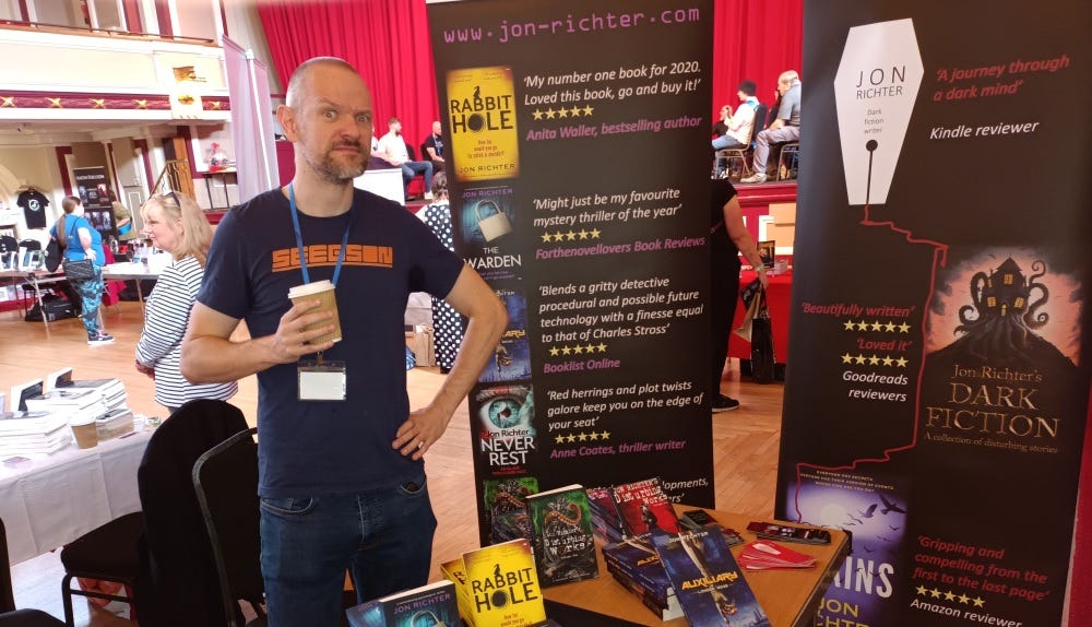 Dark fiction author presents his work at the Tales on Trent book signing event. Dark fiction author presents his work at the Tales on Trent book signing event.