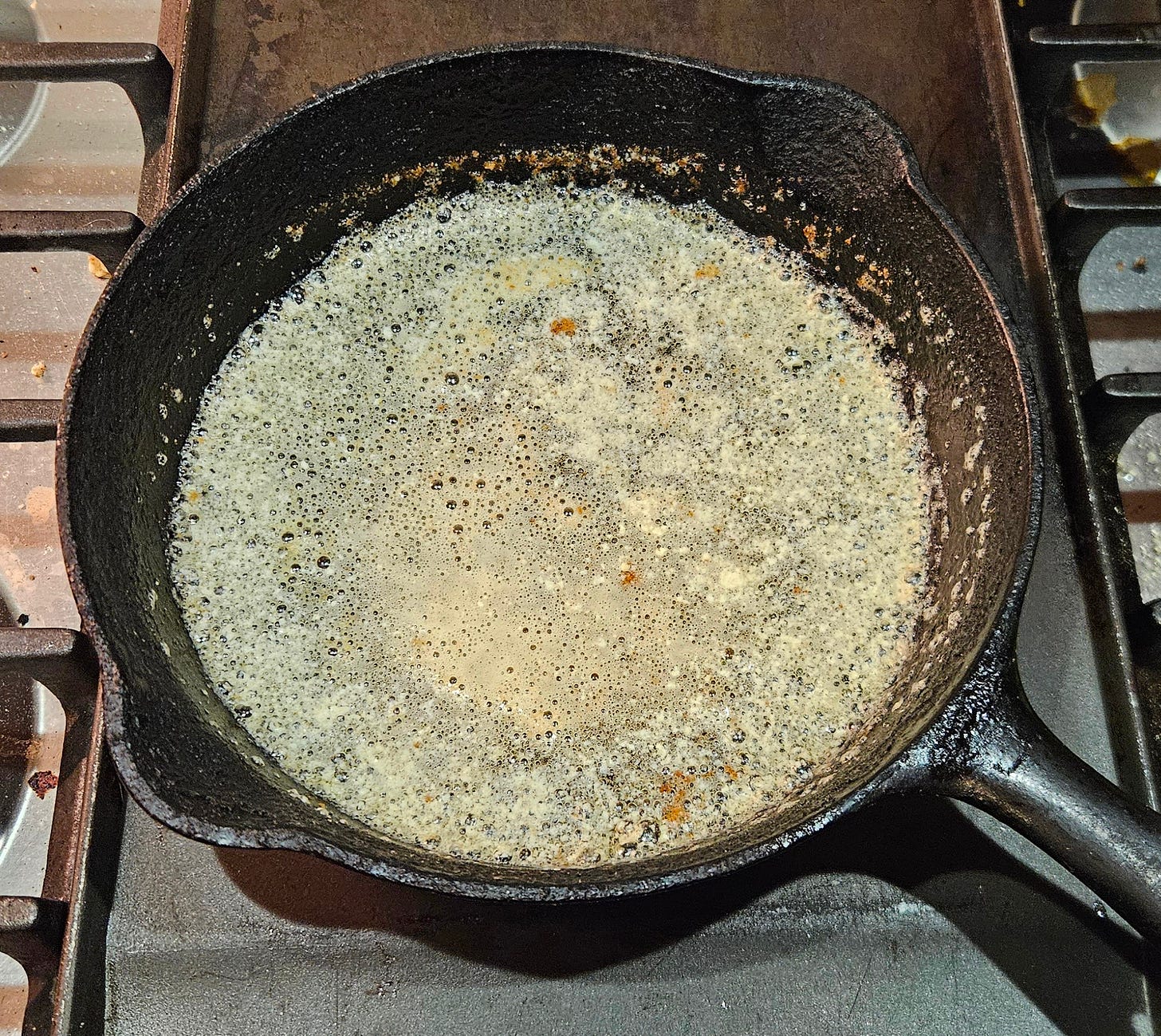 Cast iron frying pan with browned butter