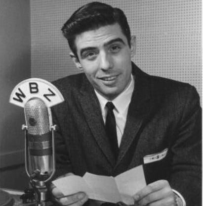 A person sitting at a microphone

AI-generated content may be incorrect.