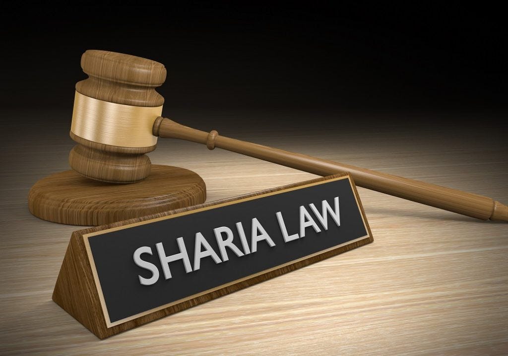 Sharia Law - Image of the words sharia law written on a name plate