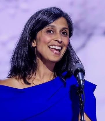 A person in a blue dress

AI-generated content may be incorrect.