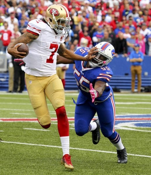 colin kaepernick fighting off bills jerry hughes colin kaepernick fighting off bills jerry hughes