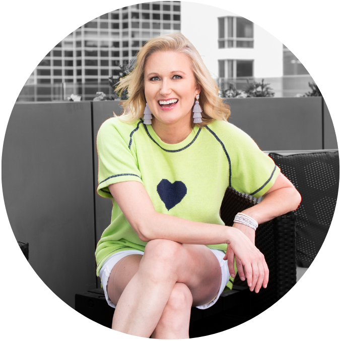 a smiling blonde woman (Katherine Sauer) in a shirt with a heart on it a smiling blonde woman (Katherine Sauer) in a shirt with a heart on it