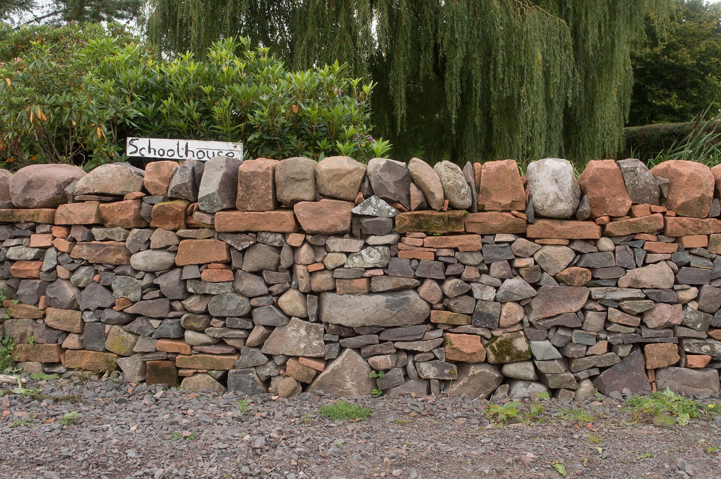stone wall, mixed red-brown and grey