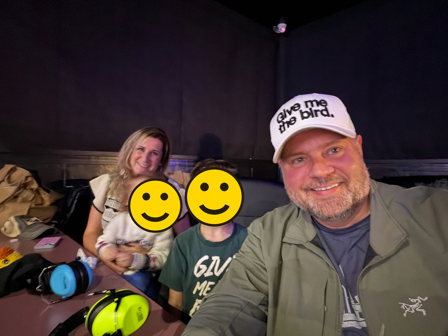 Family at TGR film night, faces covered with smiley emojis Family at TGR film night, faces covered with smiley emojis