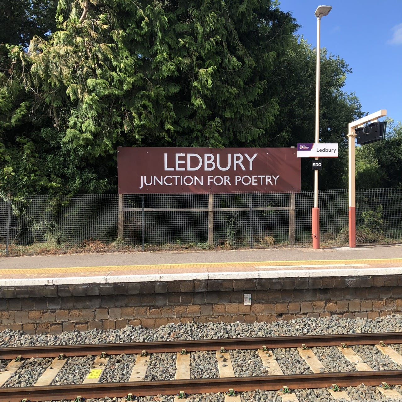Rail station sign: Ledbury -- Junction for Poetry