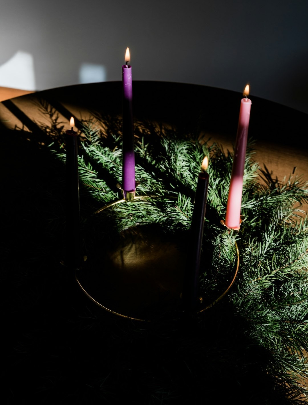 a group of candles sitting on top of a table