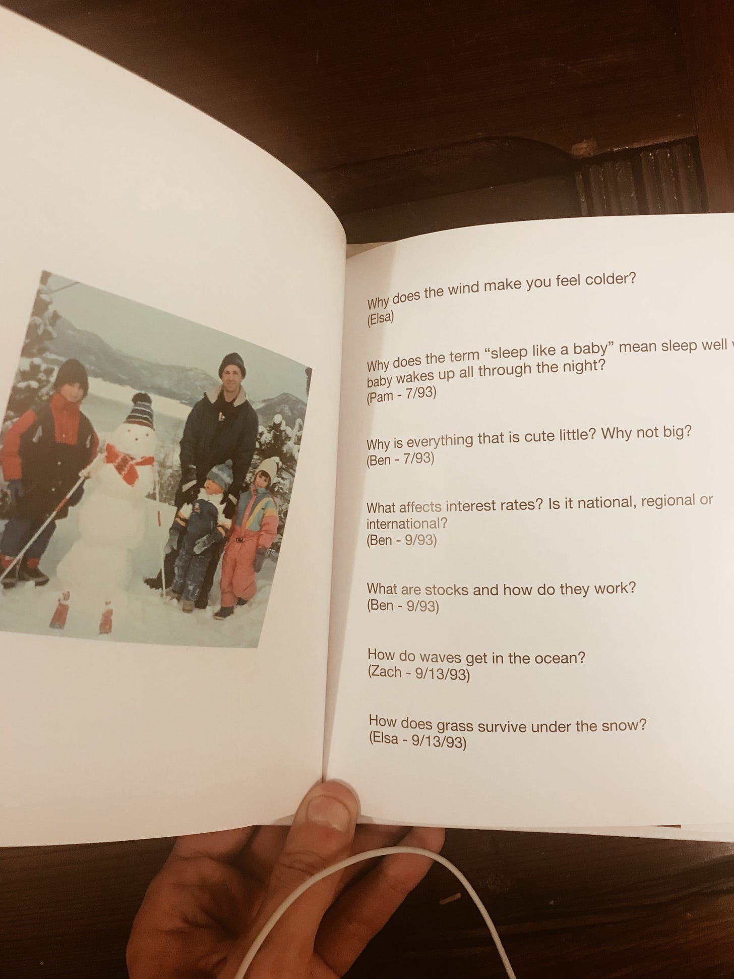 Another page of questions, across from a page of the fam with a snowman