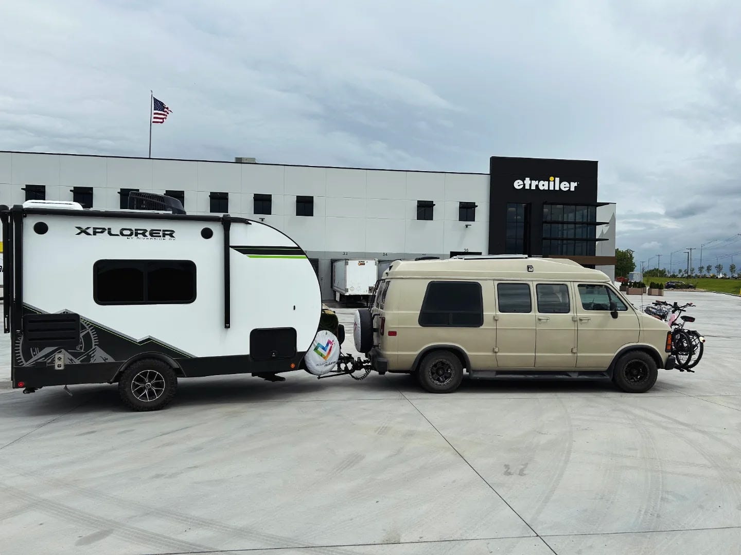 Stan the Van and Carmen the Camper parked in front of the etrailer building in Wentzville. MO.