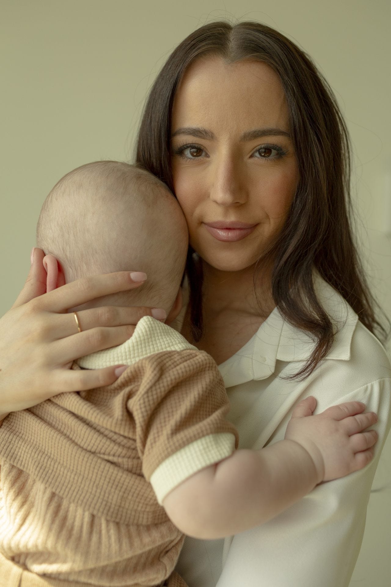 Ashley St. Clair and the child she had with Elon Musk.