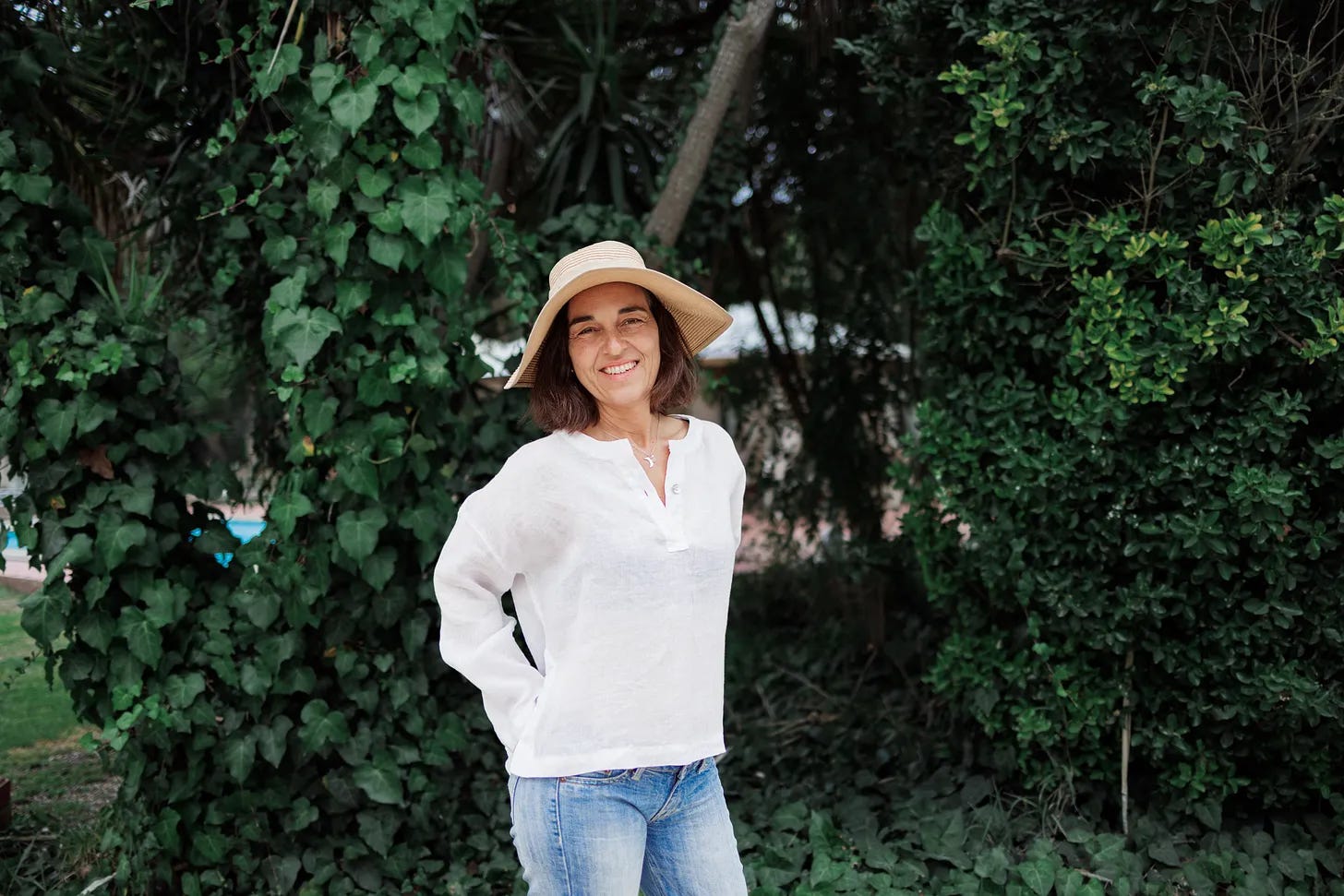 Luciana in the garden at the Orange Bloom Homestead & Guesthouse, in Portugal