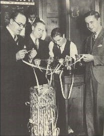 Gathering around the stock ticker during the 1929 US stock market crash.