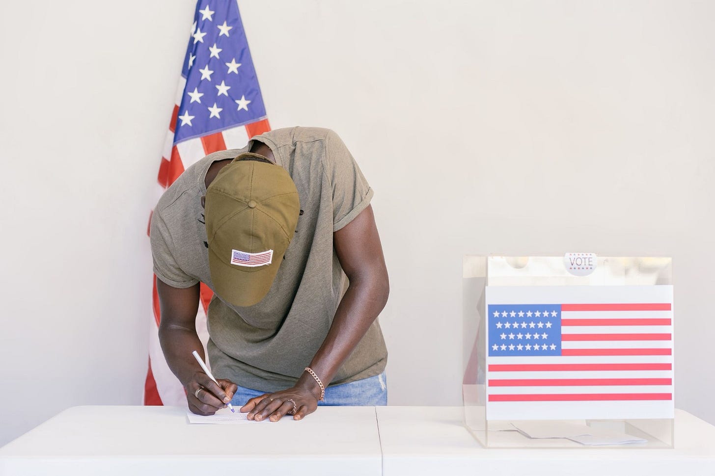 A man casting his ballot.