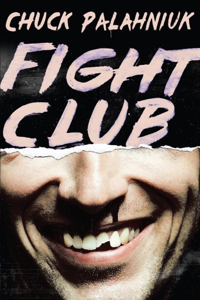 Book cover of 'Fight Club' by Chuck Palahniuk featuring a smiling face with a torn paper effect above the title.