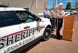 A picture containing text, outdoor, transport, car

Description automatically generated