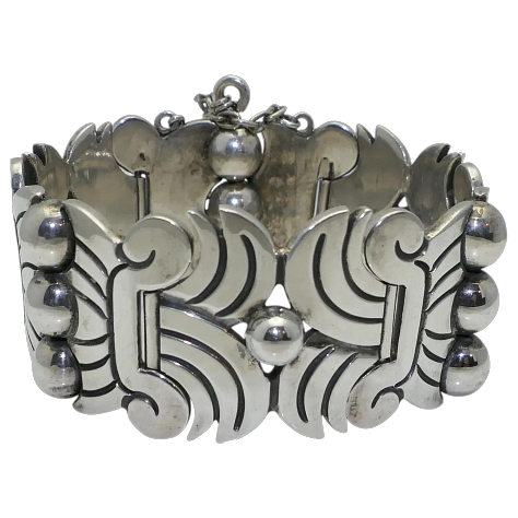 https://www.rubylane.com/item/2013583-ABG192/Taxco-Sterling-Floral-Motif-Link-Bracelet