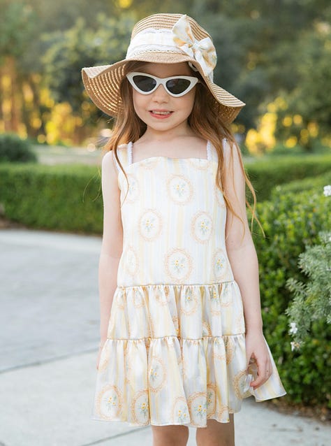 EXCLUSIVE: Has Meghan Markle (and Lili) Been (Out)-AI'd By a California  Children's Clothing Company?