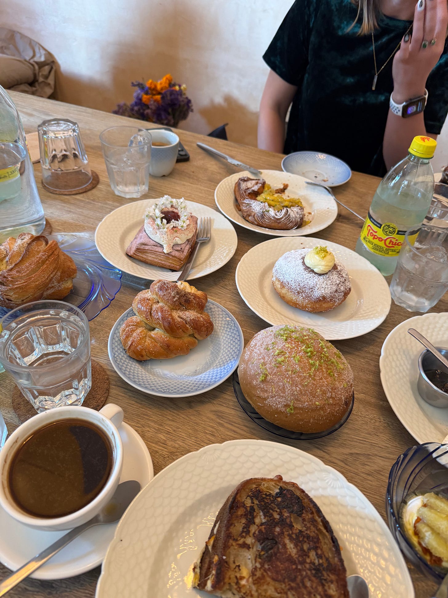 A table covered with pastries.