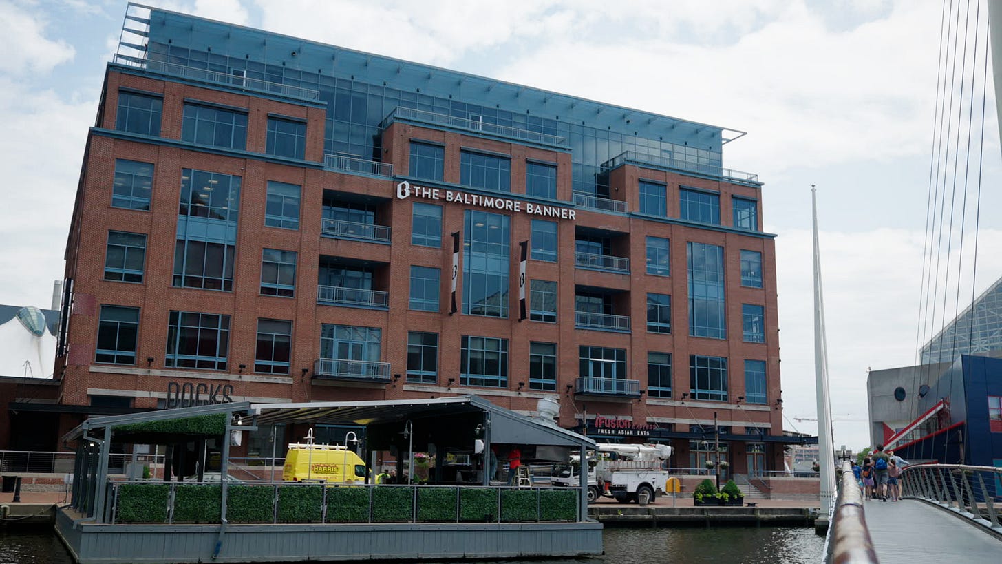 The building that says baltimore banner on it in Baltimore The building that says baltimore banner on it in Baltimore
